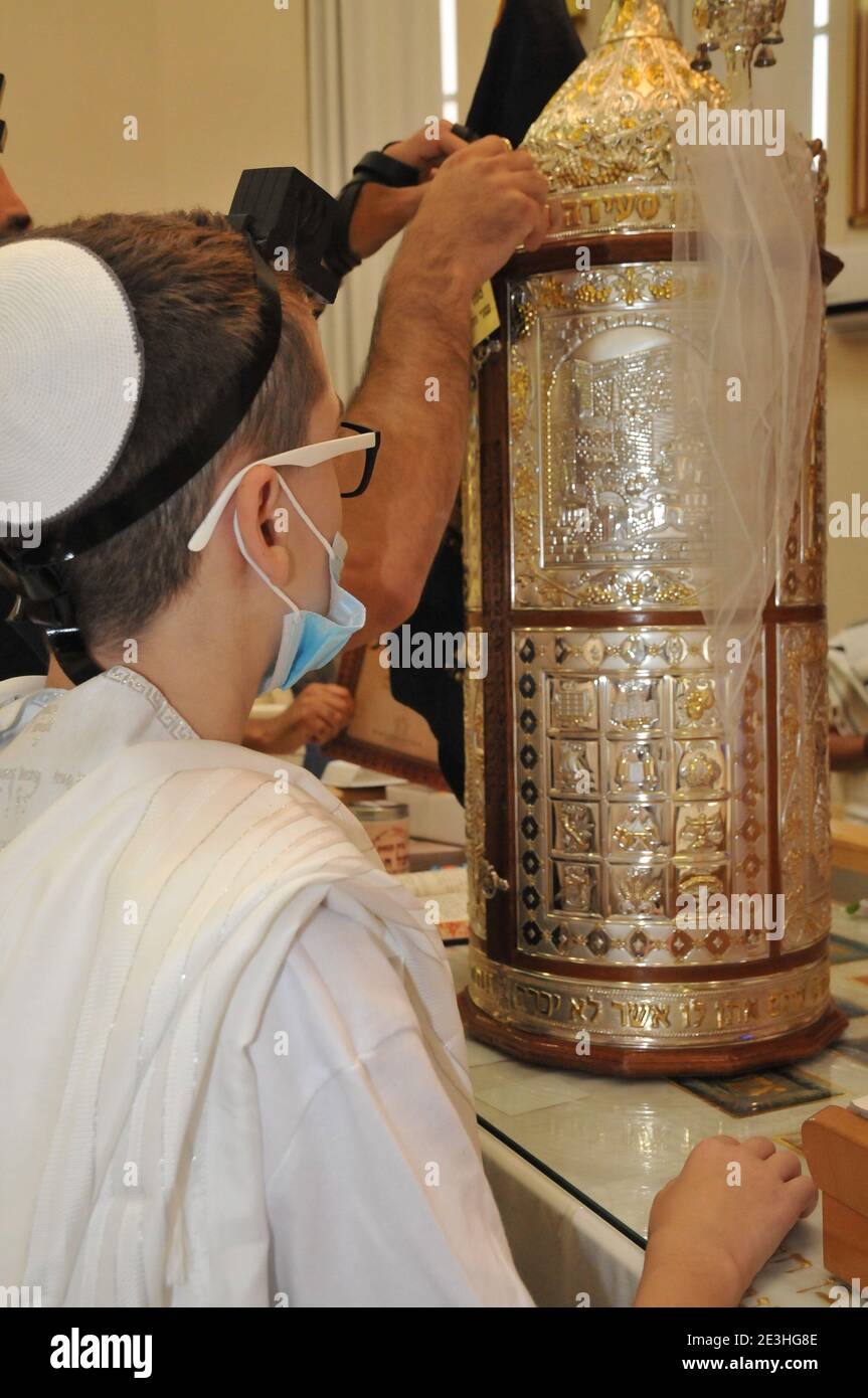Bar Mitzvah concept A Jewish boy of thirteen is performing the rites to ...