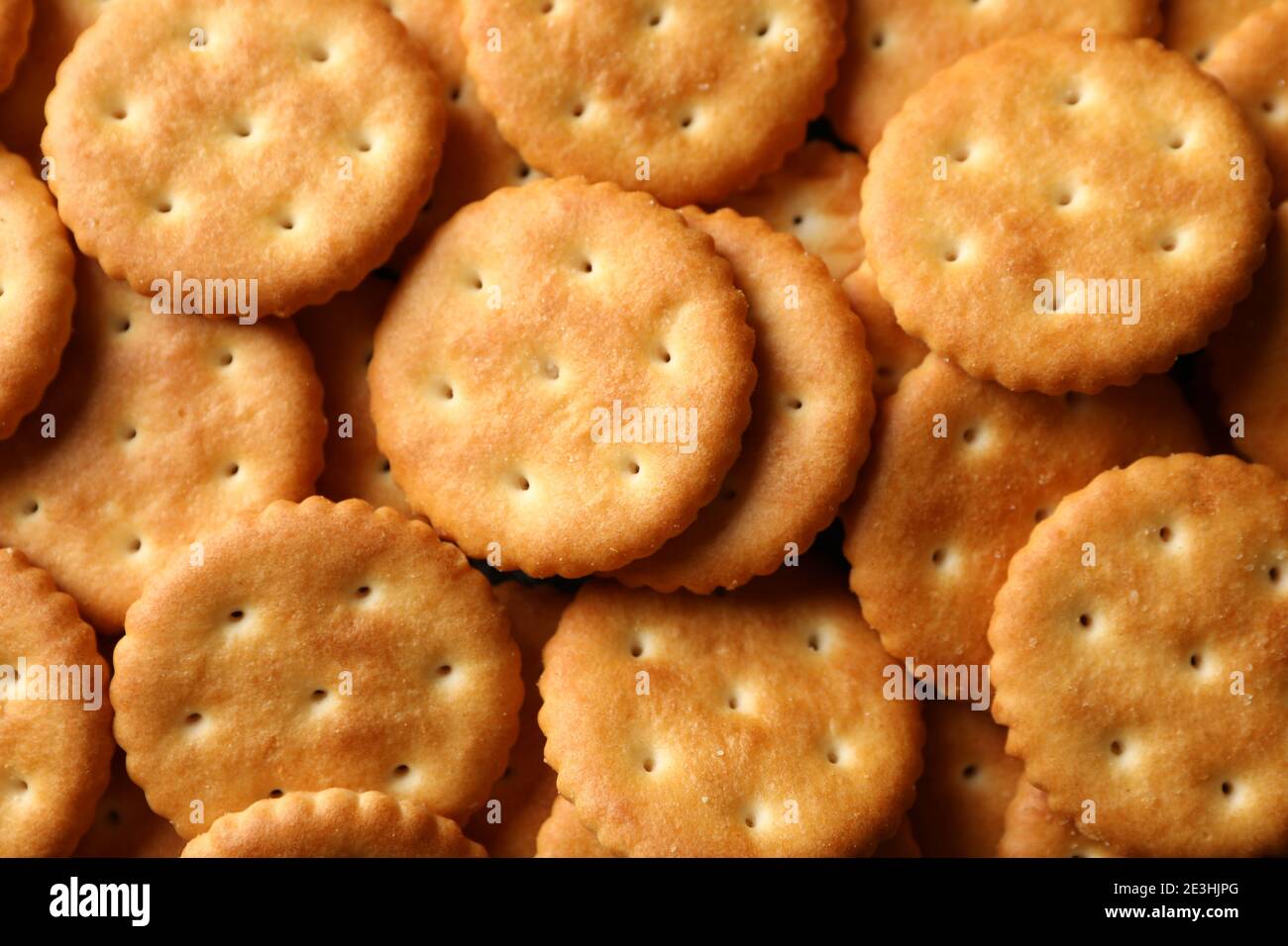 Tasty cracker biscuits on whole background, close up Stock Photo Alamy