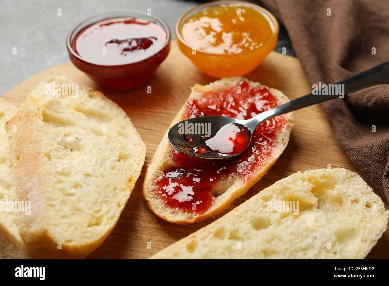 Concept of breakfast with toast with jam on black smokey background ...