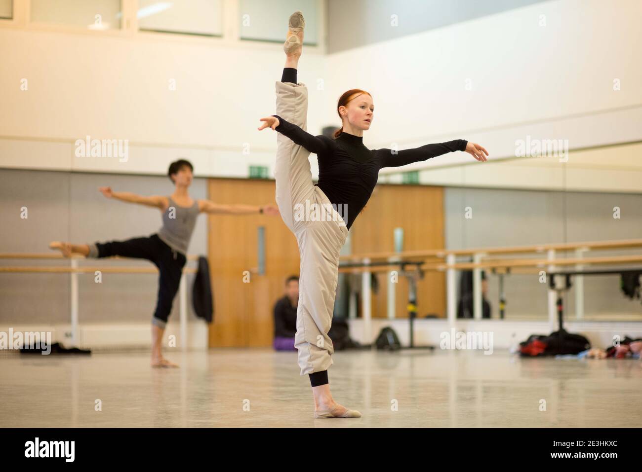 Russian ballerina with high Développé in ballet class Stock Photo - Alamy
