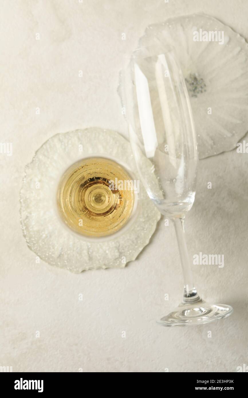 Champagne glasses and epoxy resin on white background Stock Photo