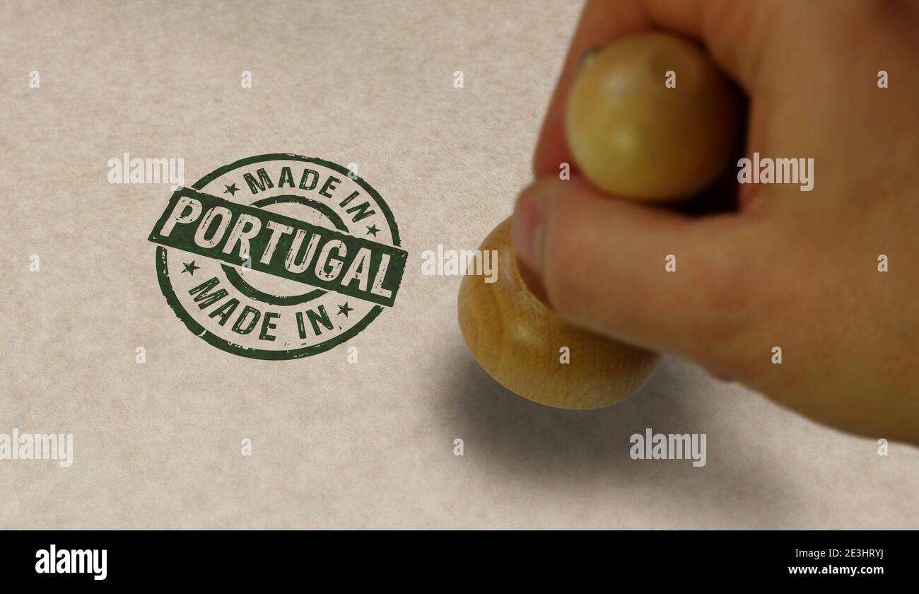 Made in Portugal stamp and stamping hand. Factory, manufacturing and production country concept. Stock Photo