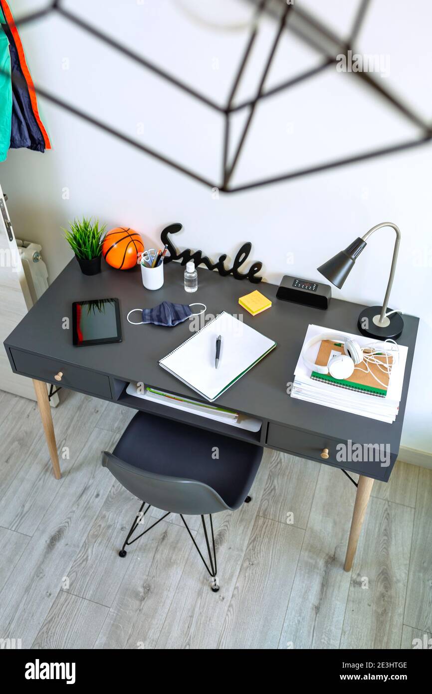 Youth bedroom interior with desk Stock Photo Alamy