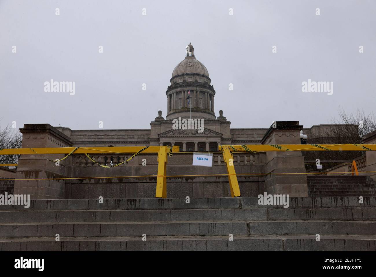 01162021- Frankfort Kentucky, USA: Barrier outside the Kentucky statehouse on a snowy day before planned protests before the Biden inauguration, January 16, 2021. The Statehouse will be blocked off by security Sunday when armed protesters angry about the loss of Donald Trump to Joe Biden are expected to arrive. Washington D.C. and statehouses across the United States are on through at least inauguration day. Stock Photo