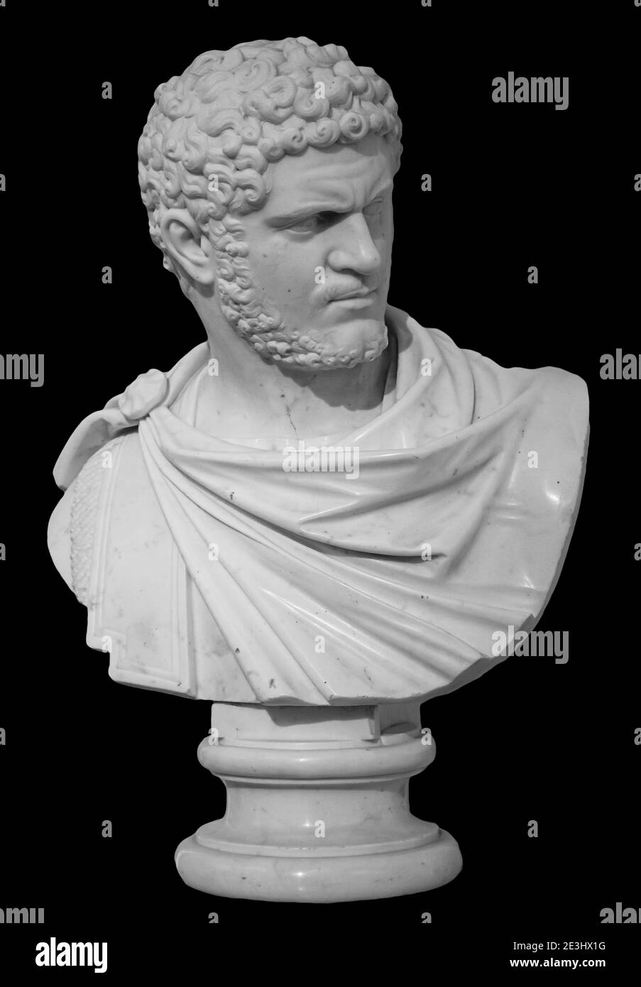 Ancient white marble sculpture bust of Caracalla. Marcus Aurelius Severus Antoninus Augustus known as Antoninus. Roman emperor. Isolated on black Stock Photo