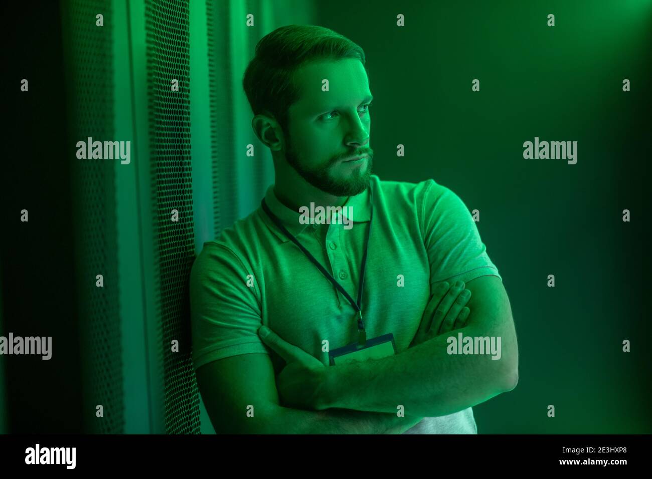 Serious smart man folded his arms across his chest Stock Photo Alamy