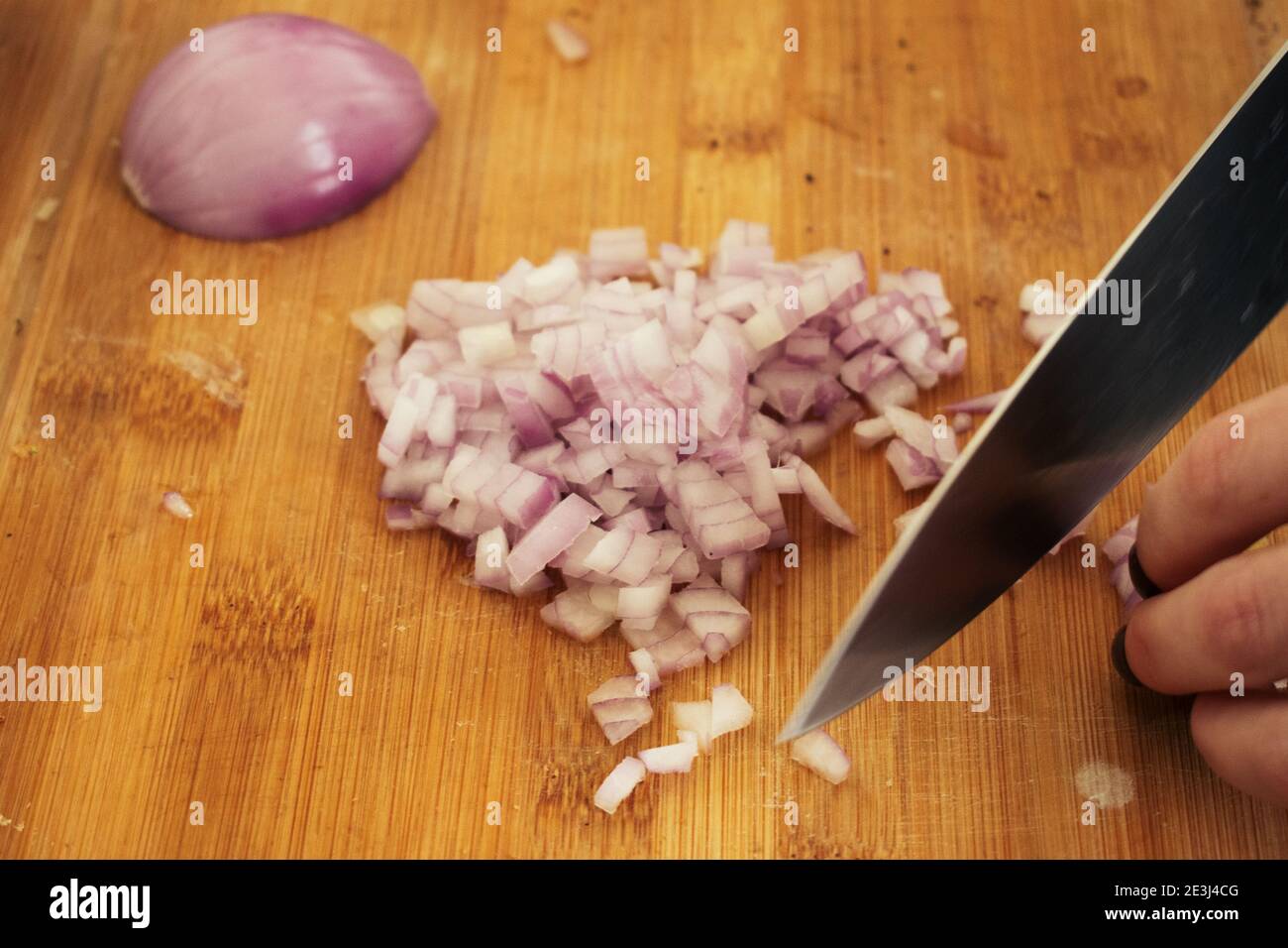 Woman chef cutting chopping onion hi-res stock photography and images ...