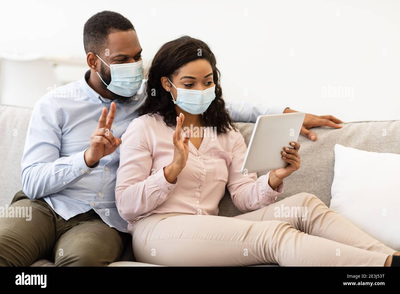 Black couple mask using hi-res stock photography and images - Alamy