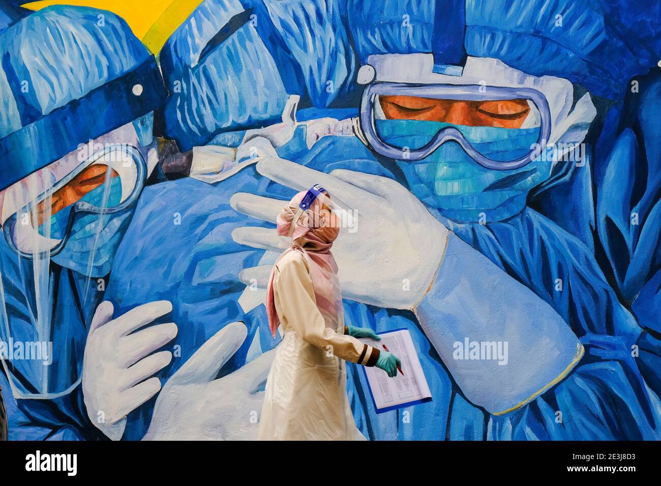 Shah Alam Malaysia 19th Jan 2021 A Medical Staff From Nur Ajwa Private Clinic Wears A Personal Protective Equipment Ppe Suit Seen During A Covid 19 Drive Thru Screening Test At Shah Alam Ismail
