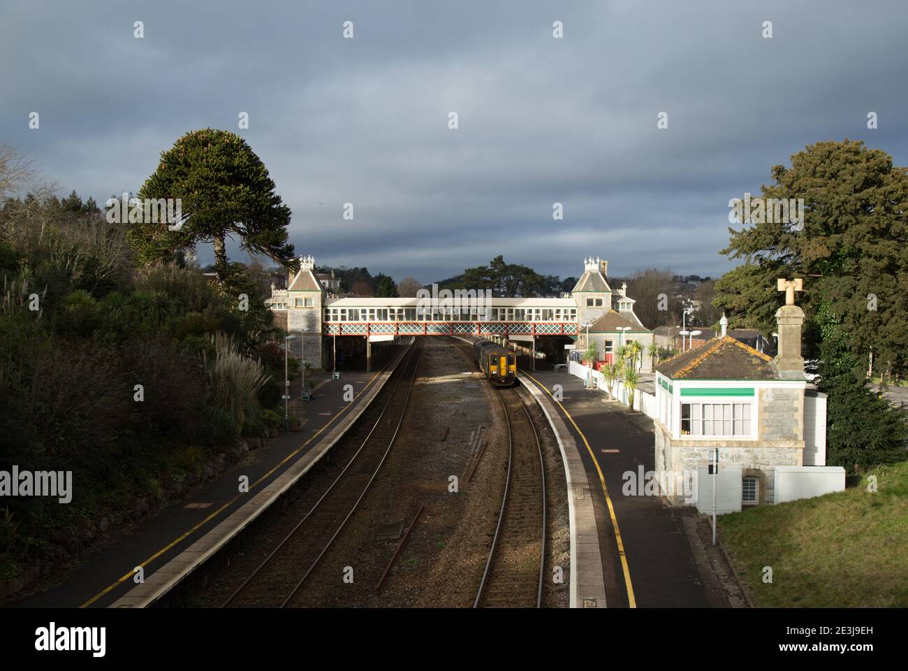 Torquay Railway Station with departing Train Stock Photo