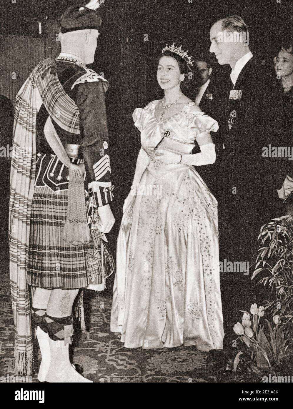 EDITORIAL ONLY Princess Elizabeth of York and Prince Philip seen here in 1949 chatting with a Scots Sergeant-Major in full regimentals.  Princess Elizabeth of York, 1926 - 2022, future Elizabeth II, Queen of the United Kingdom.  Prince Philip, Duke of Edinburgh, born Prince Philip of Greece and Denmark,1921- 2021. Husband of Queen Elizabeth II of the United Kingdom.  From The Queen Elizabeth Coronation Book, published 1953. Stock Photo