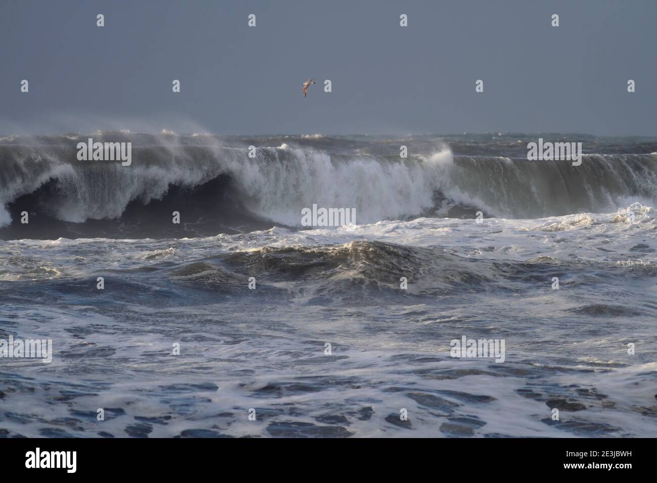 Beach storming sea waves in hi-res stock photography and images - Alamy