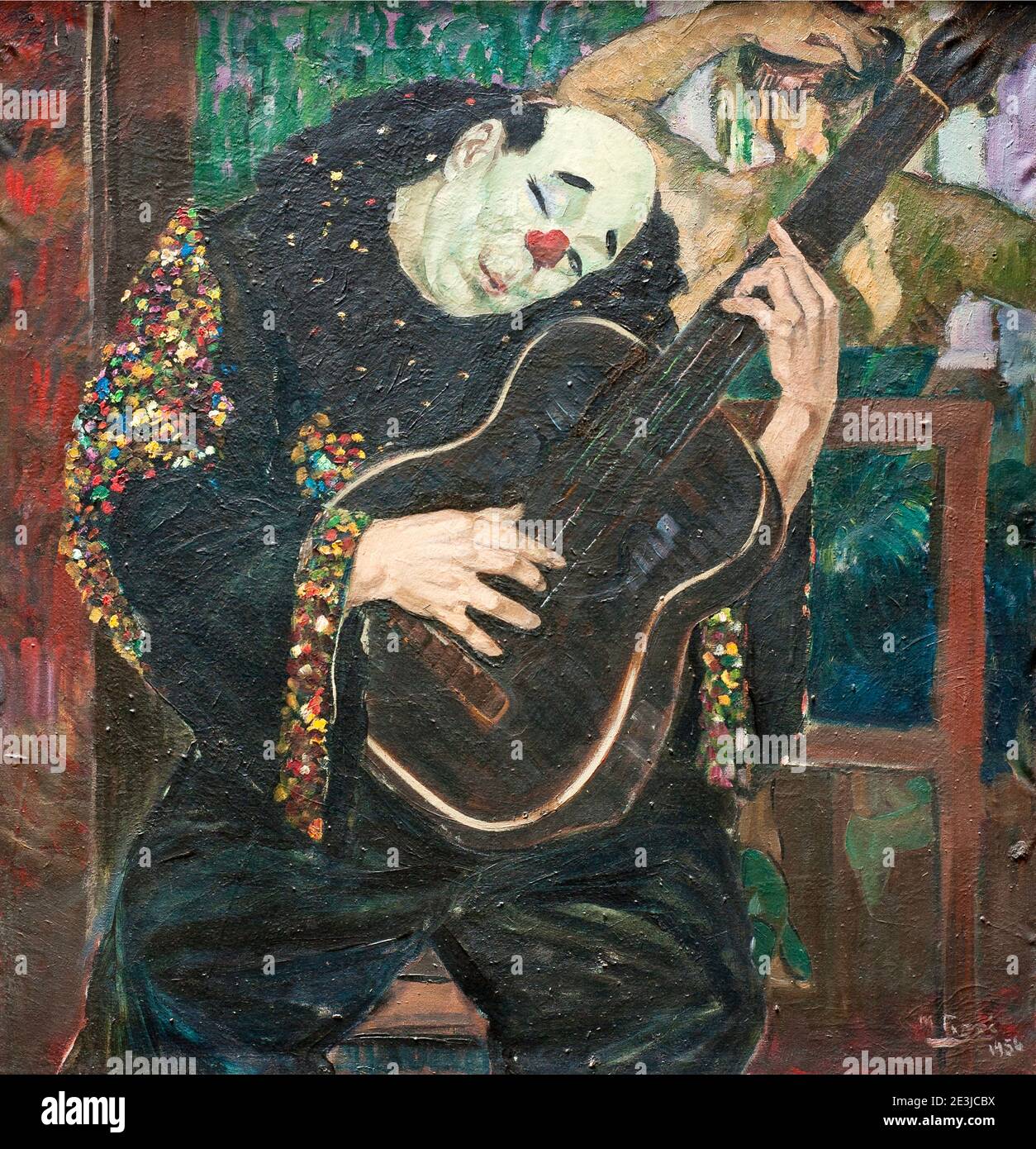 Manuel Rose painting called Payaso con Guitarra shows a clown in costume playing guitar-1956 Stock Photo