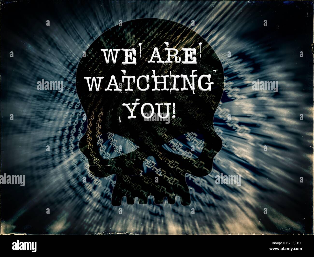 We Are Watching You! text written across Black Skull on Binary code blue background on a vintage distressed looking computer digital display screen Stock Photo