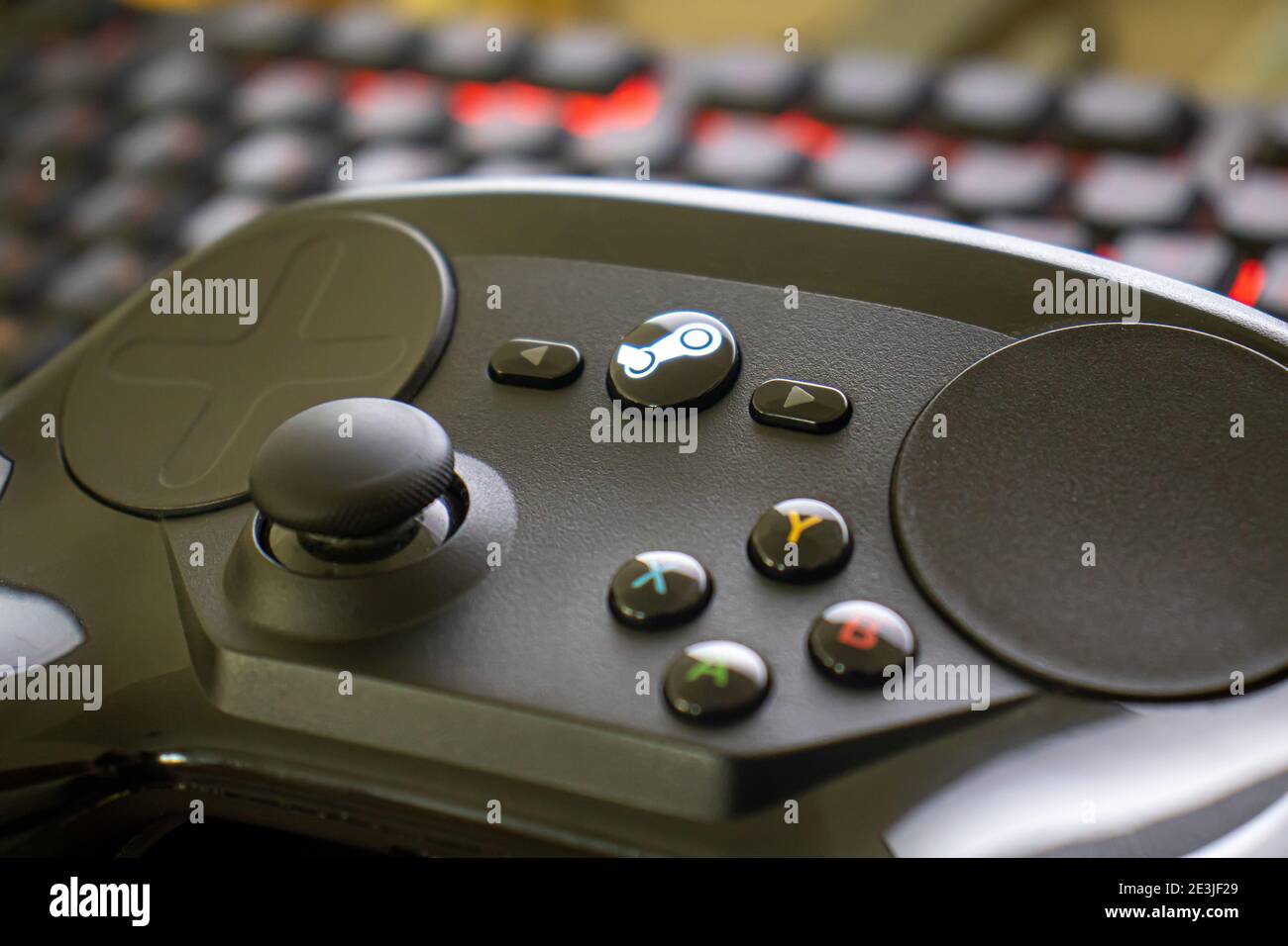 Steam Controller On A Red Illuminated Gaming Keyboard Stock Photo Alamy