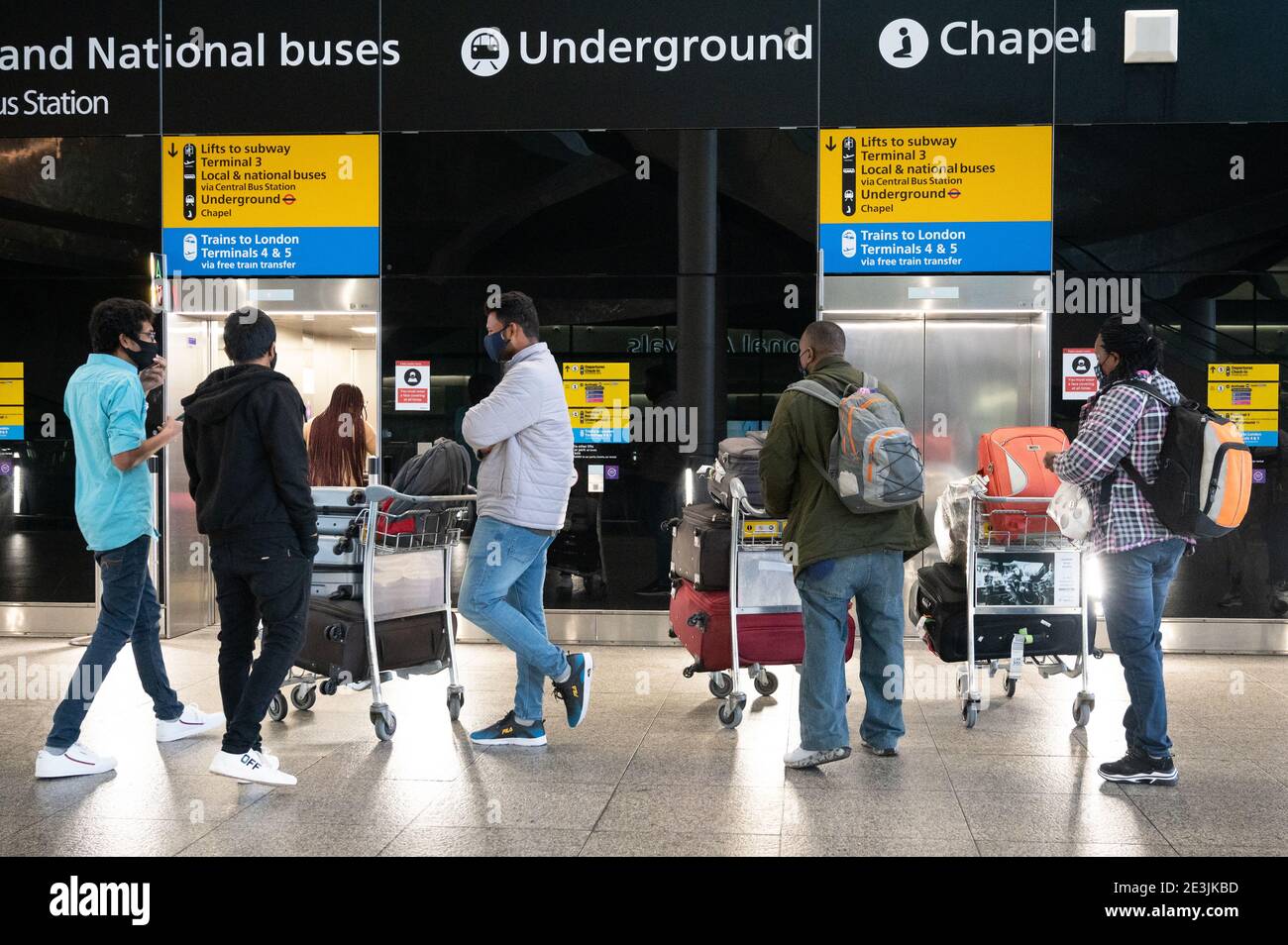 19 January 2021. Travellers in the international arrival area of Heathrow Airport near London. Travel corridors in the the UK were closed at 04:00 hours on 18 January 2021 as British government declared. Travellers arriving to England from anywhere outside the UK have to to self-isolate for 10 days and must have proof of a negative coronavirus test. Photo by Ray Tang Stock Photo