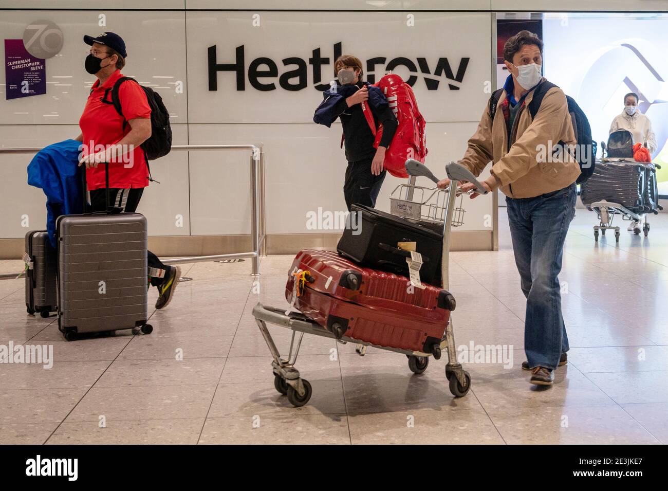 19 January 2021. Travellers in the international arrival area of Heathrow Airport near London. Travel corridors in the the UK were closed at 04:00 hours on 18 January 2021 as British government declared. Travellers arriving to England from anywhere outside the UK have to to self-isolate for 10 days and must have proof of a negative coronavirus test. Photo by Ray Tang Stock Photo