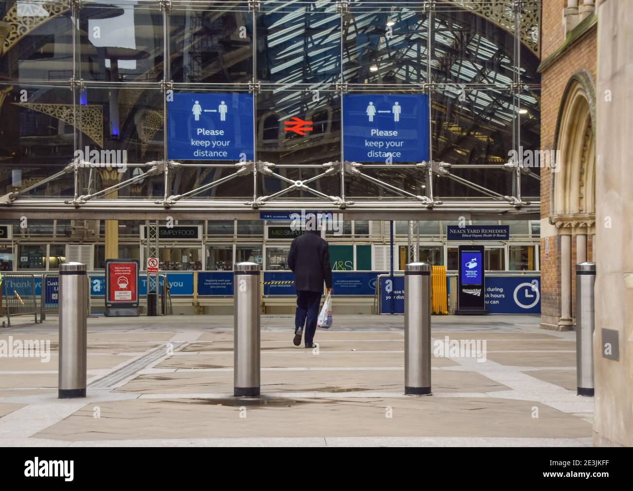 Social distancing signs at a quiet Liverpool Street Station in London ...