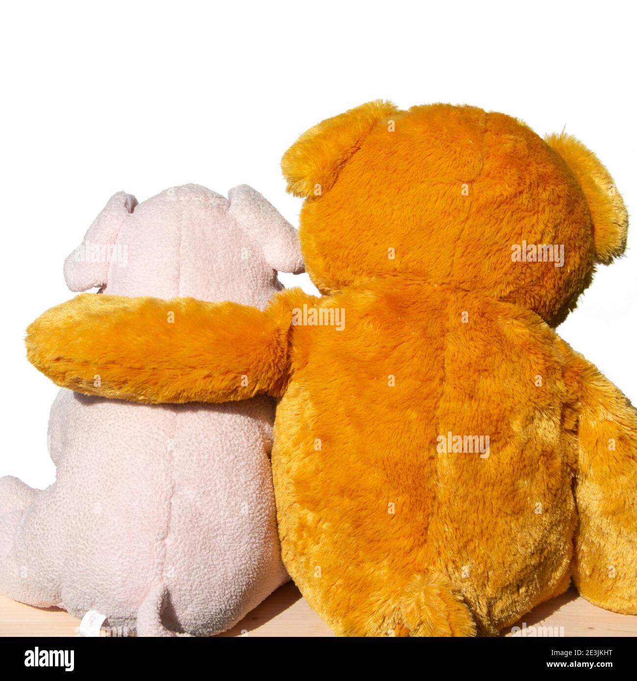 Two soft toys hug each other Stock Photo Alamy