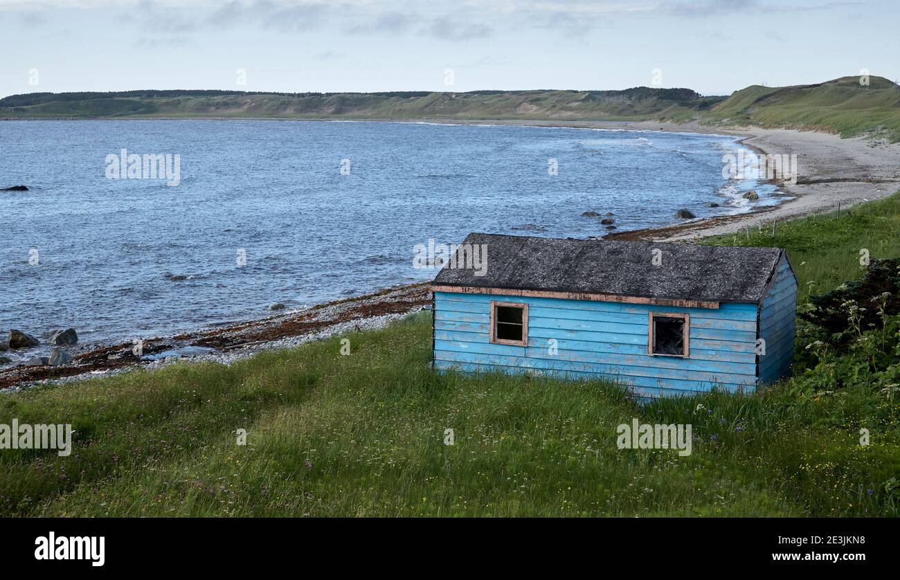 Fishermans cabin by empty coastal bay in Newfoundland Stock Photo