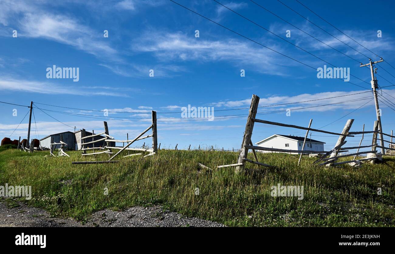 Farmstead with broken fence in Newfoundland Stock Photo