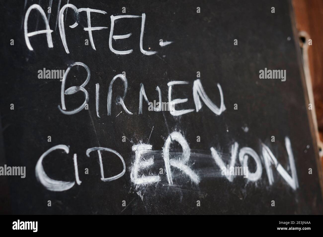 blackboard with handwritten words for apple, pear and cider in german langugae Stock Photo