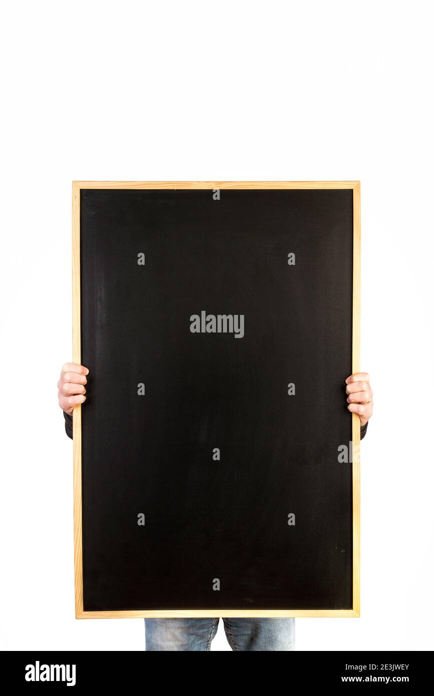 Man holding a blackboard on a white background Stock Photo