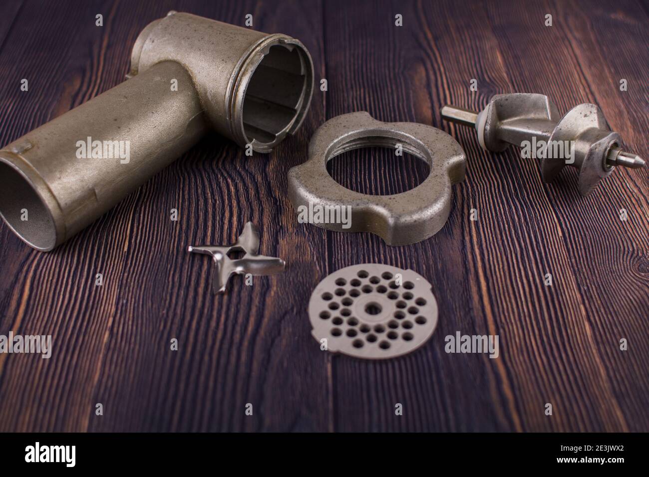 Disassembled Manual Vintage Meat Grinder On Wooden Table. Hand Tool For  Grinding Various Products. Antique Kitchen Utensils. Stock Photo, Picture  and Royalty Free Image. Image 152877034.