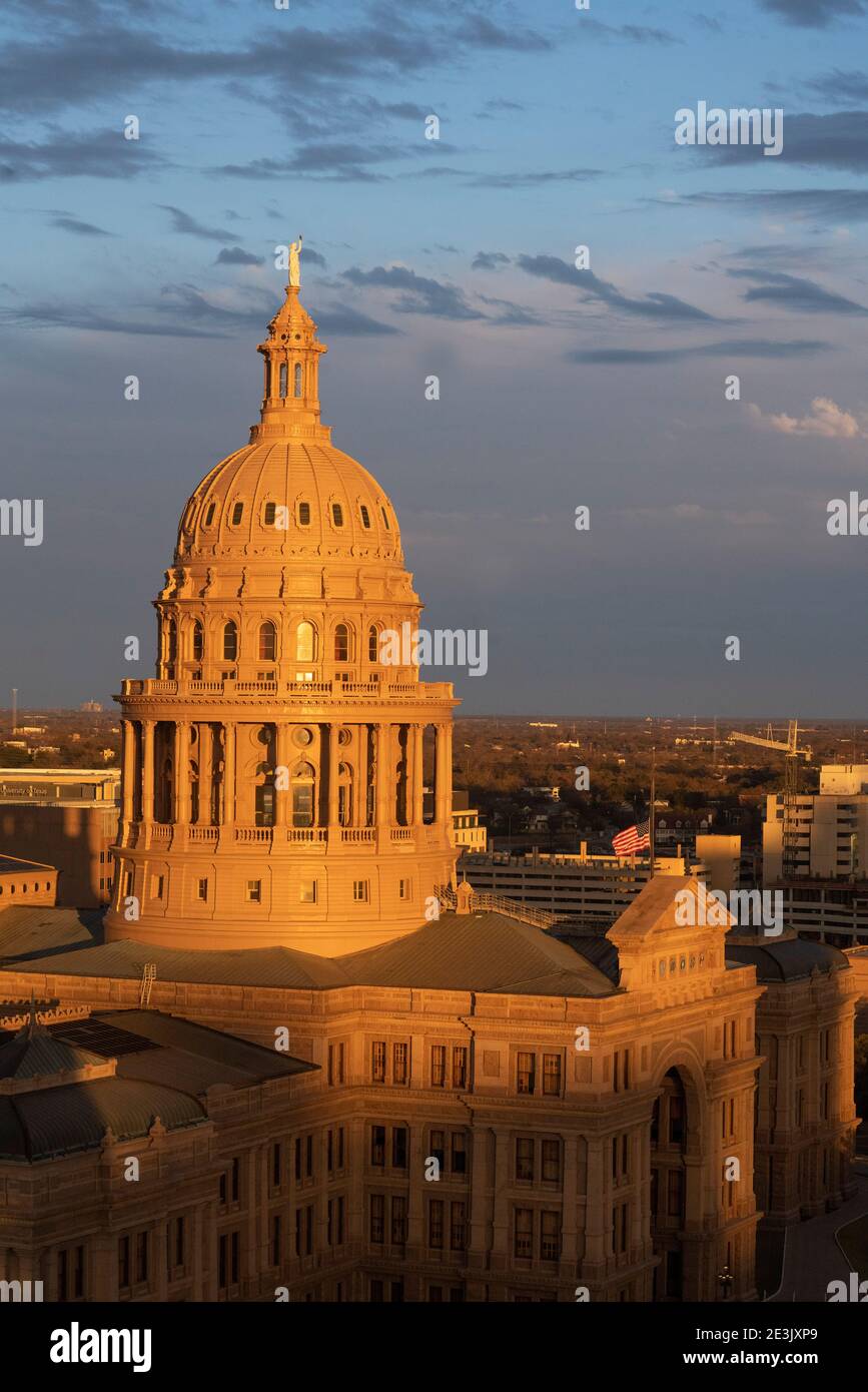 The Texas Capitol is seen at sunset in the evening of the opening of 87th Legislative session on January 12, 2021. The 308-foot tall building was designed by Elijah Myers in 1881. Civil engineer Reuben Walker oversaw construction from 1882-1887. ©Bob Daemmrich Stock Photo