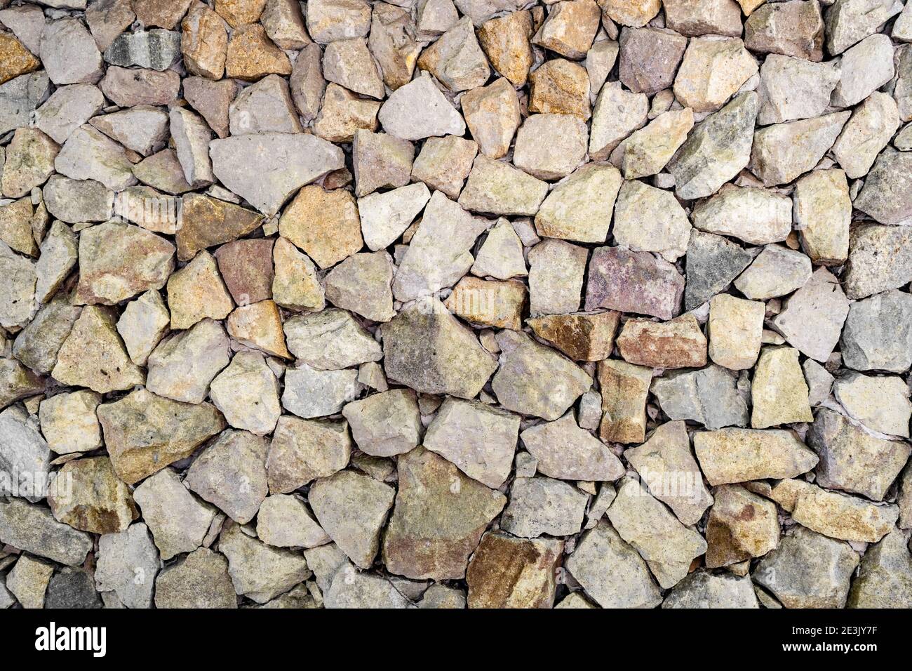Multicolored textured stone wall.  Background. Stock Photo