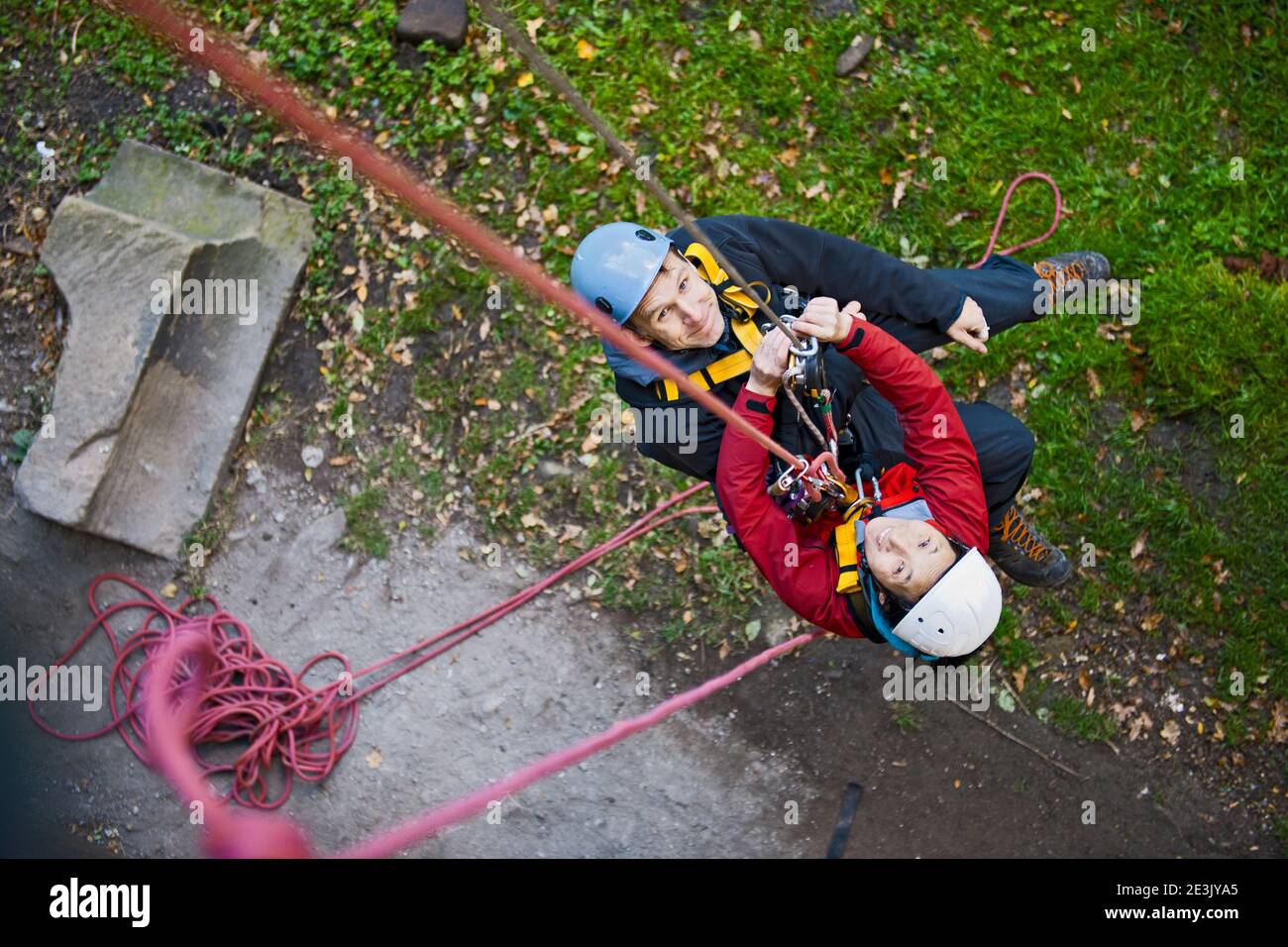 Kind Rescue Rope couple practising high rope rescue in the UK Stock Photo - Alamy