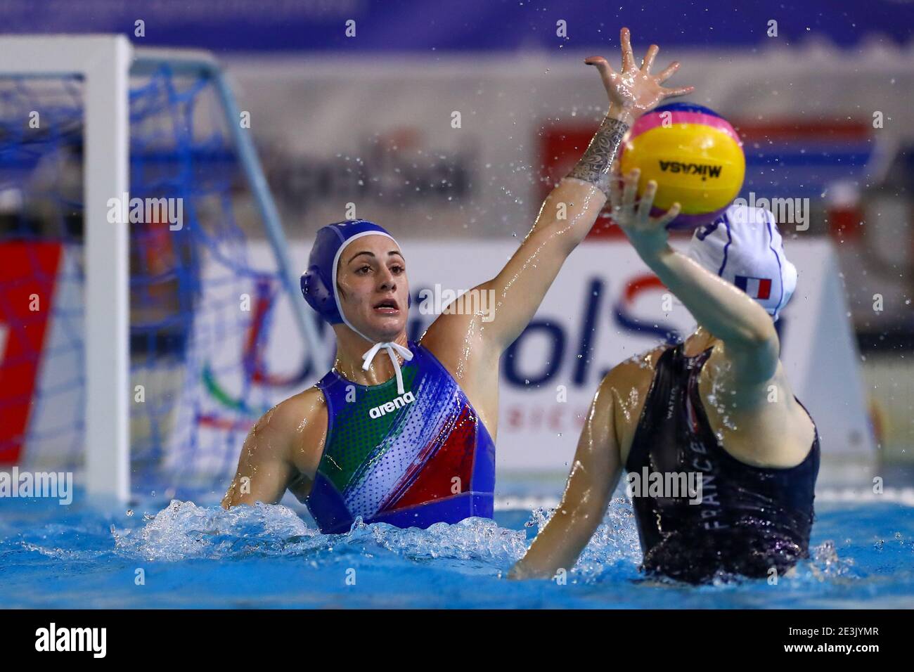 TRIESTE, ITALY - JANUARY 19: Claudia Roberta Marletta of Italy, Ema Martine  Vernoux of France during the match between France and Italy at Women's  Water Polo Olympic Games Qualification Tournament at Bruno
