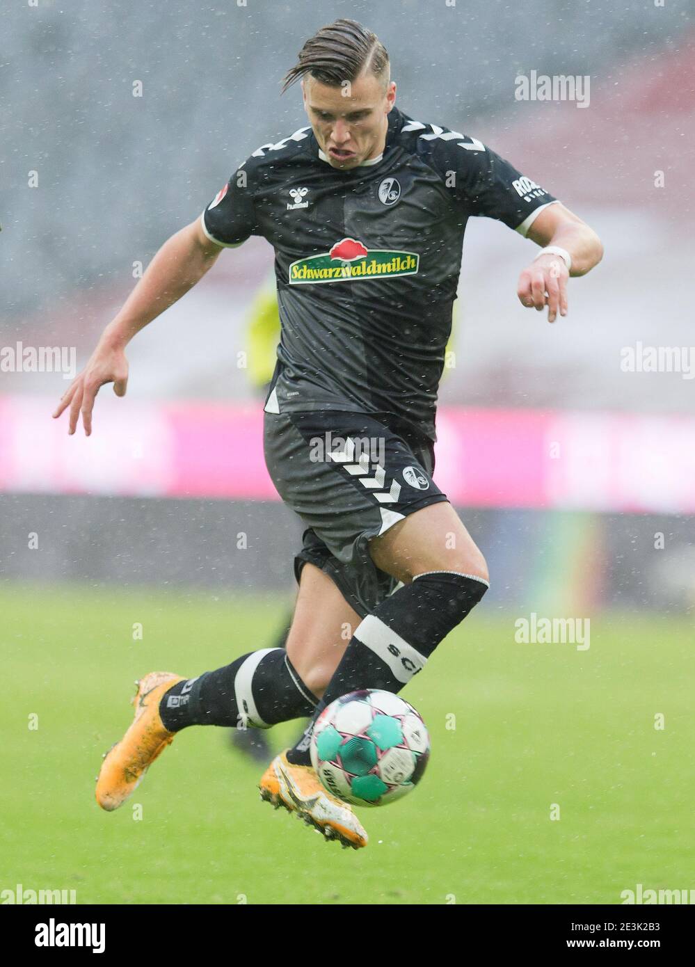 Ermedin Demirovic (SC Freiburg). Action, single action, single image, cut  out, whole body shot, whole figure football 1st Bundesliga season  2020/2021, 16.matchday, matchday16, FC Bayern Munich - SC Freiburg on  January 17th,