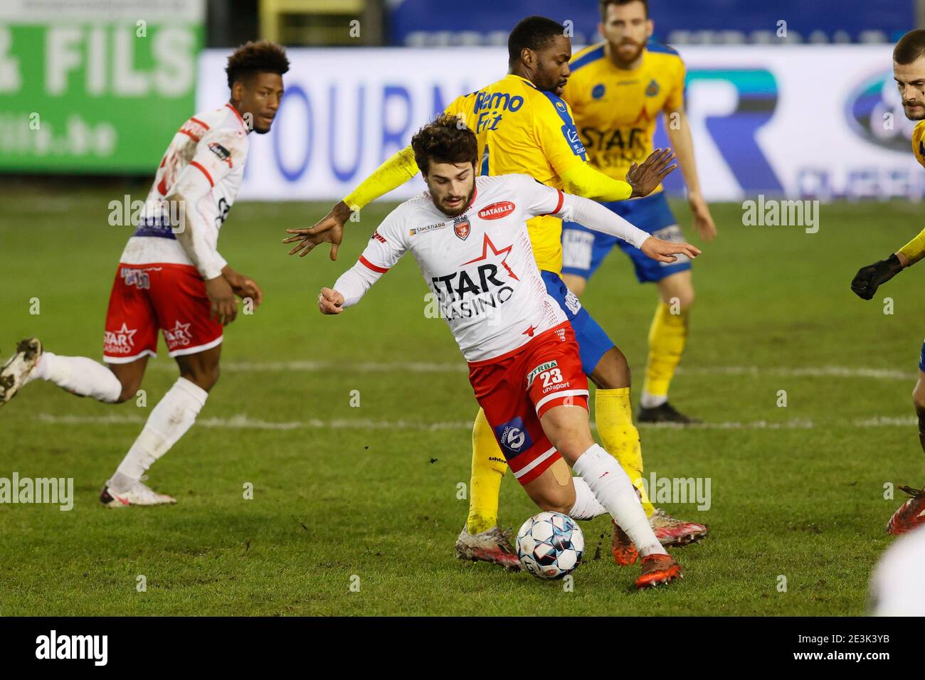 Mouscron's Bruno Xadas Alexandre Vieira Almeida and Waasland-Beveren's Georges Mandjeck fight for the ball during a soccer match between Royal Excel M Stock Photo