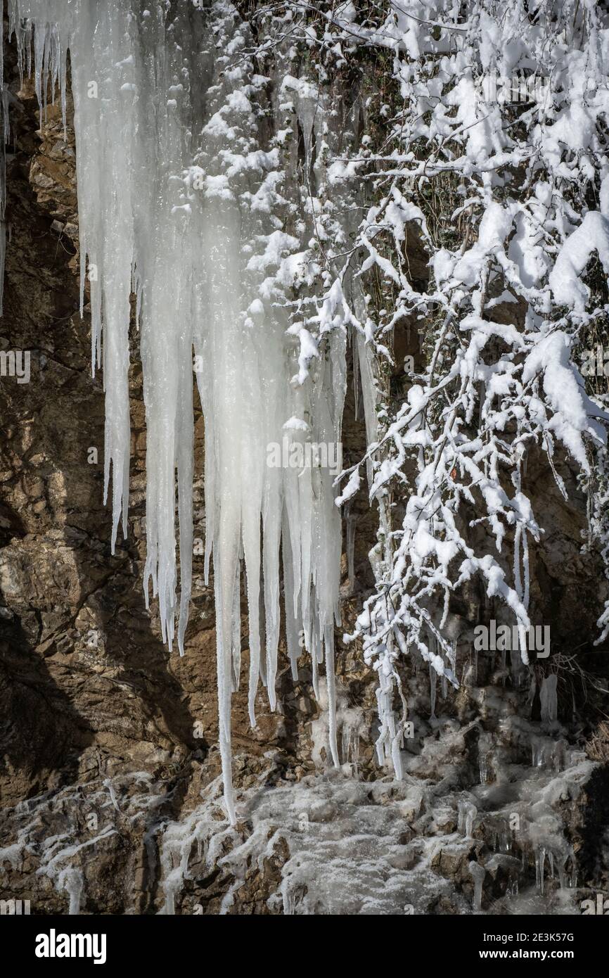 Icicles at the frozen waterfall Rotes Tor in Rankweil Stock Photo