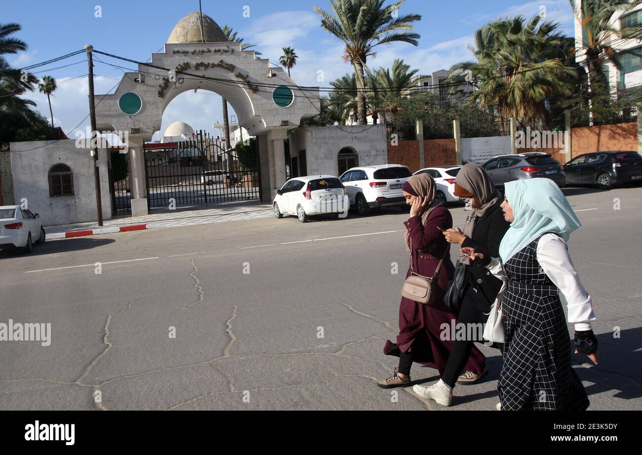 Palestinians walk past the entrance gate of the Legislative Council building in Gaza City on Tuesday on January 19, 2021. Palestinian president Mahmud Abbas on January 15, announced dates for the first elections in more than 15 years, setting legislative polls for May 22 and a July 31 presidential vote. Abbas's Fatah party, which controls the Palestinian Authority based in the occupied West Bank and the Hamas Islamists, who hold power in Gaza, have for years expressed interest in taking Palestinians back to the polls. Photo by Ismael Mohamad/UPI Stock Photo