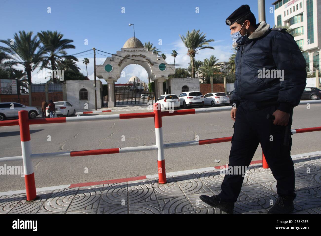 A Palestinian policeman walks past the entrance gate of the Legislative Council building in Gaza City on Tuesday on January 19, 2021. Palestinian president Mahmud Abbas on January 15, announced dates for the first elections in more than 15 years, setting legislative polls for May 22 and a July 31 presidential vote. Abbas's Fatah party, which controls the Palestinian Authority based in the occupied West Bank, and the Hamas Islamists, who hold power in Gaza, have for years expressed interest in taking Palestinians back to the polls. Photo by Ismael Mohamad/UPI Stock Photo