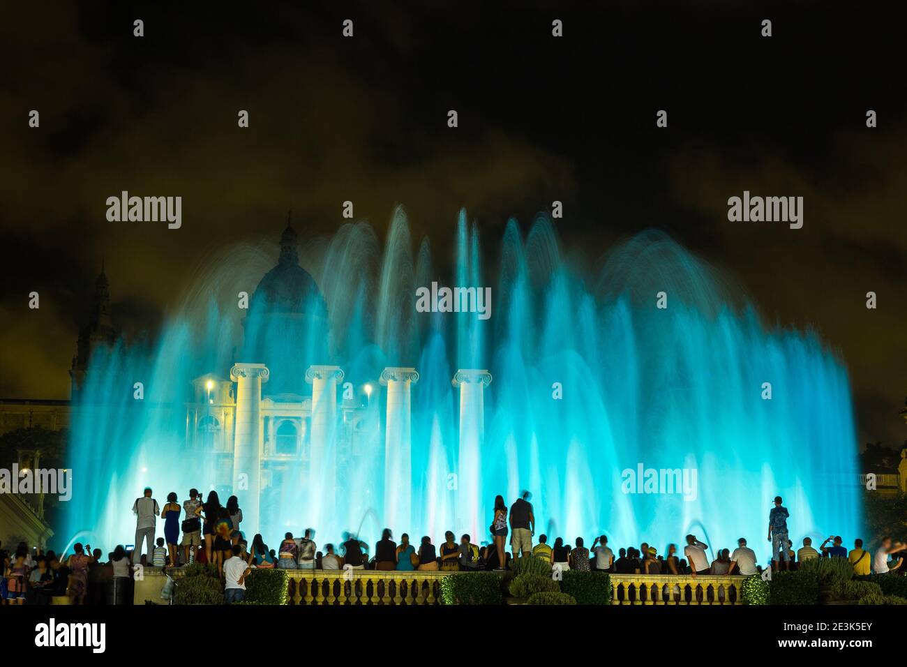 Magic Fountain light show at night next to National museum in Barcelona