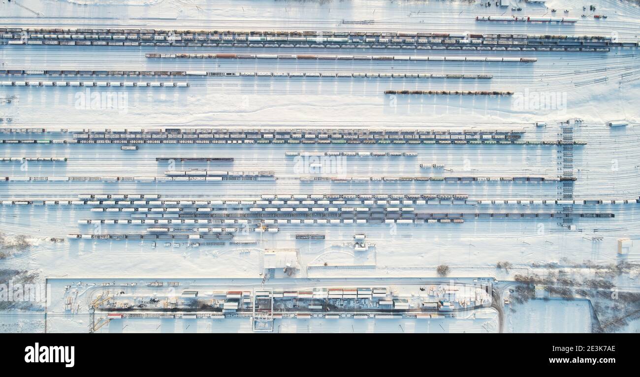 Railway cargo station aerial above top drone view snow covered Stock Photo