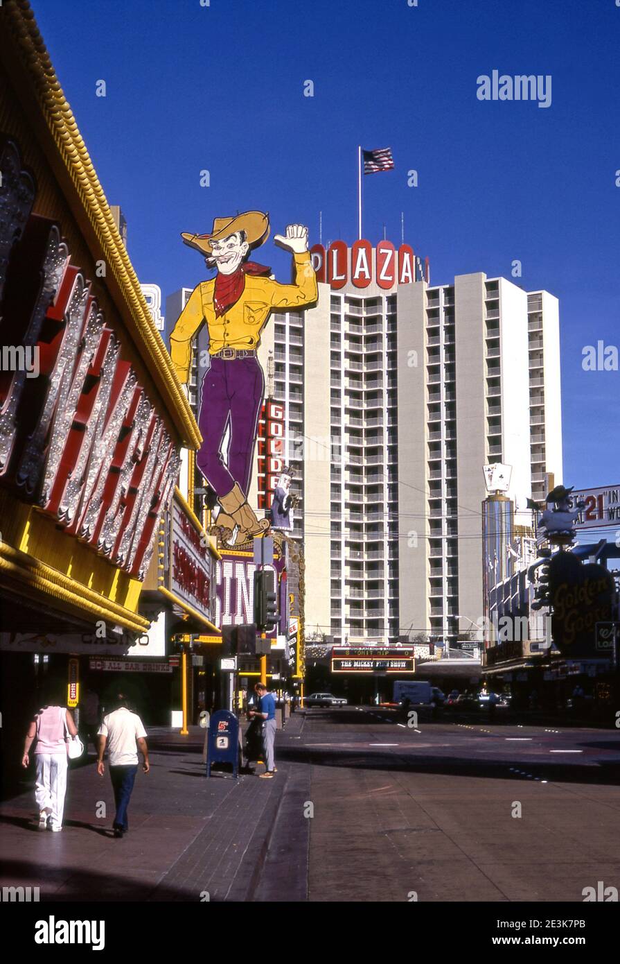 Iconic cowboy sign on Fremont Street in Downtown Las Vegas, NV. Stock Photo