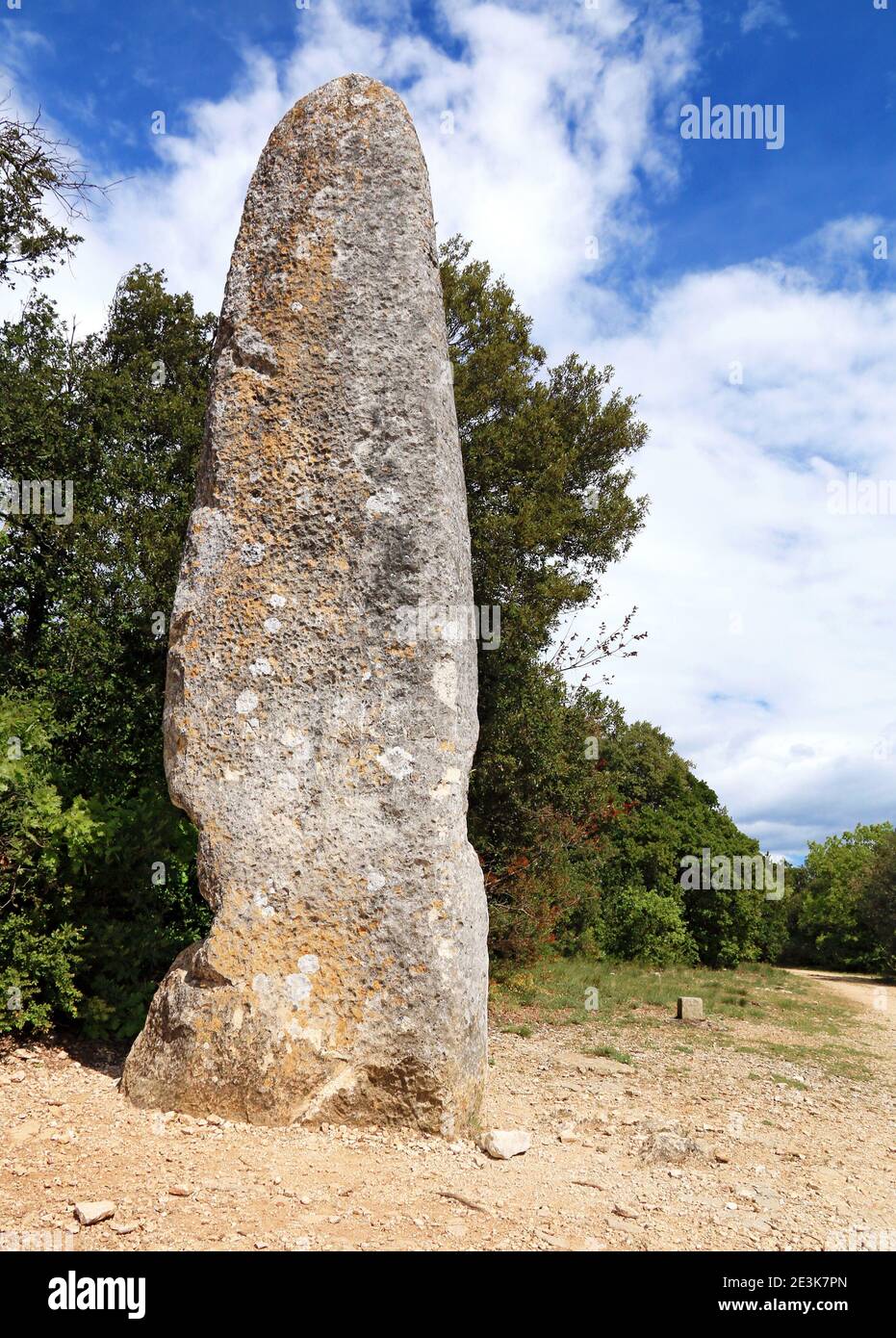Megalith of six meters high in Lussan in Gard, Occitanie, France. Stock Photo