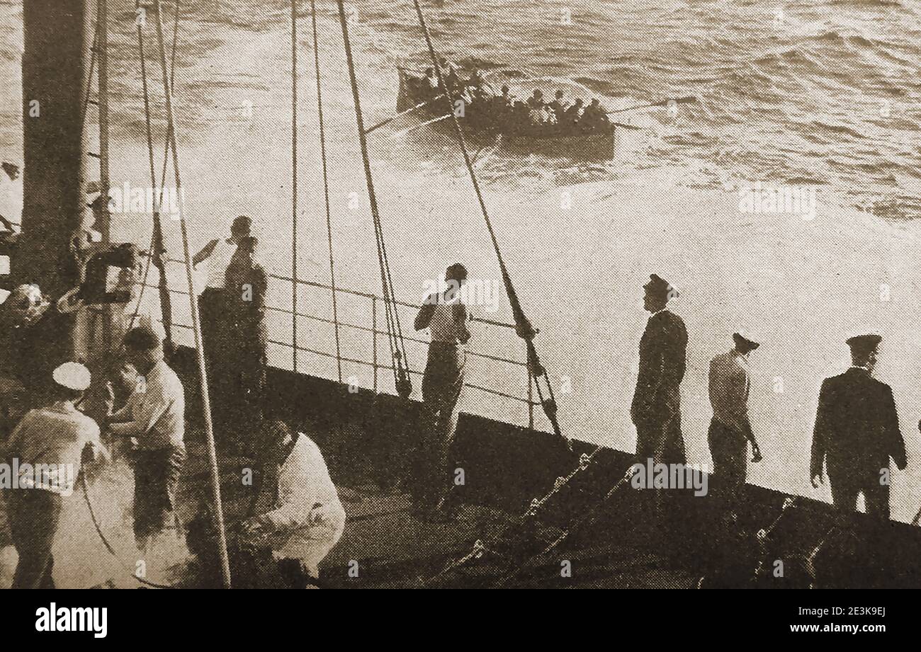 WWII - A mid atlantic rescue by an American ship, the 'American Farmer' of crewmen from the  British vessel  s s 'Kafiristan' sunk by a German torpedo. The cargo ship (5,193 GRT, 1924) was torpedoed and sunk in the Atlantic Ocean 300 nautical miles (560 km) sw of Ireland by a Uboat U-53 ( Kriegsmarine) with the loss of six of her thirty-five crew. Kafiristan was built by William Doxford & Sons Ltd.(Pallion Yard ). Owned by Hindustan Steam Shipping Co. Ltd. - Common Brothers Ltd., Newcastle,  1954 The Aviation & Shipping Co. Ltd.( Purvis ), 1961 Navegacion Skiathos S.A., Beirut, 1969 Camelia Sh Stock Photo