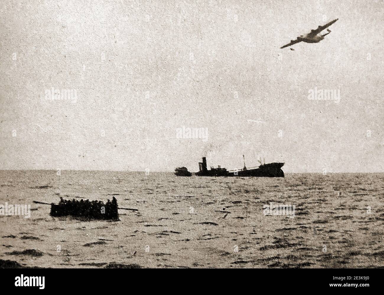 WWII - The sinking of the torpedoed British 'Kensington Court' in the Atlantic. All crew were saved -  (An RAF flying boat can be seen flying overhead) .The Steam merchant had a 4,863 tonnage. She was  completed in 1927,  built by  Napier & Miller Ltd, Old Kilpatrick, Glasgow.  Owner was Court Line Ltd (Haldin & Philipps Ltd), London (Attacked 18th September 1939 near Land's End, UK by U2-32. - 0 dead - 35 survivors - carrying a cargo of cereals - Master  was Joseph Schofield) Stock Photo
