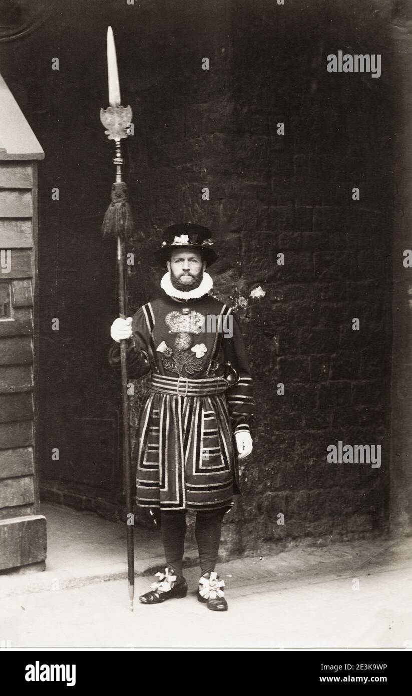 19th century vintage photograph: London Beefeater, ceremonial guard, uniform and staff. Stock Photo