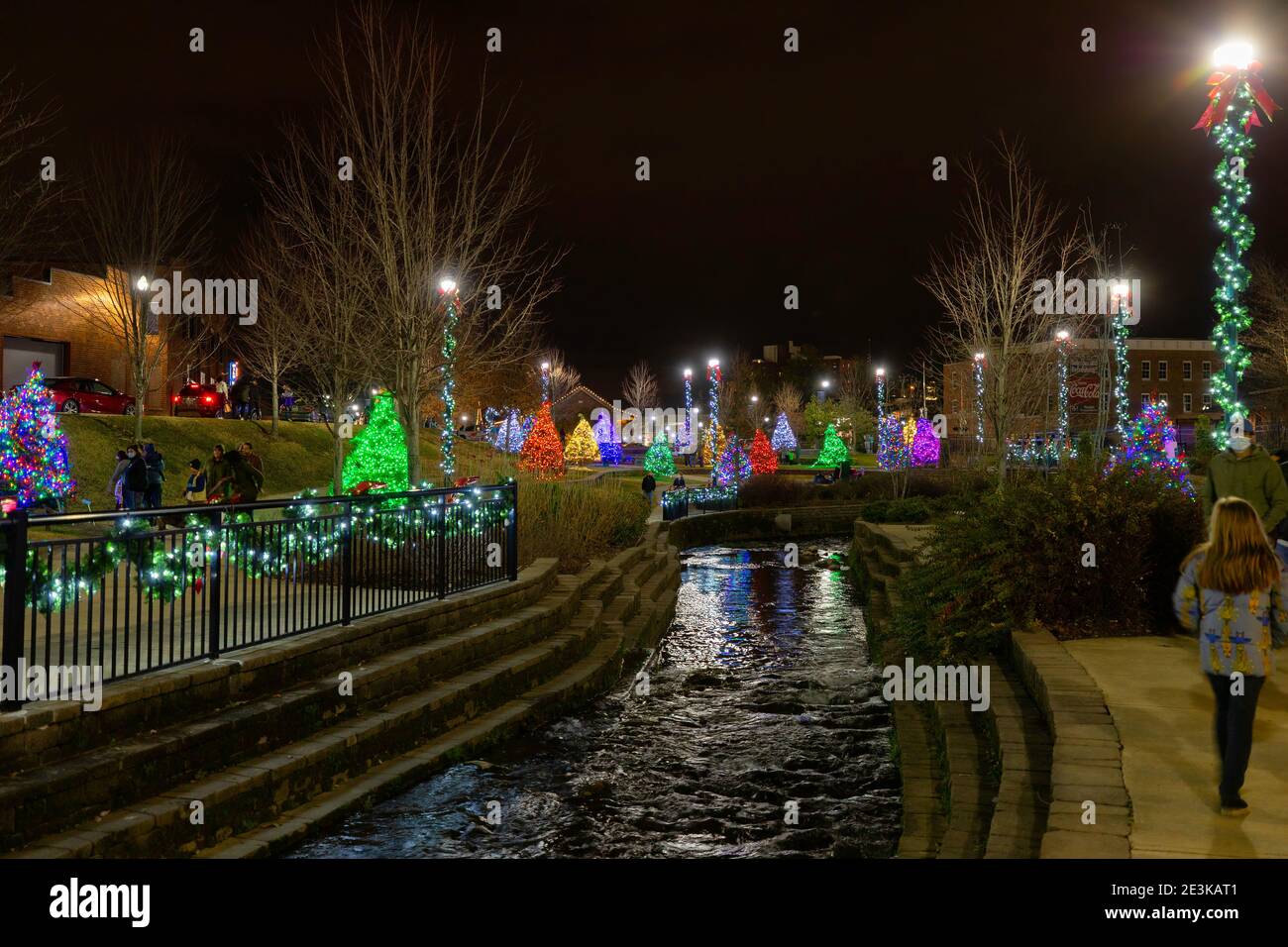 Johnson City, Tennessee, USA - December 20, 2020:  Christmas trees and lights at night in Founders Day Park. Stock Photo
