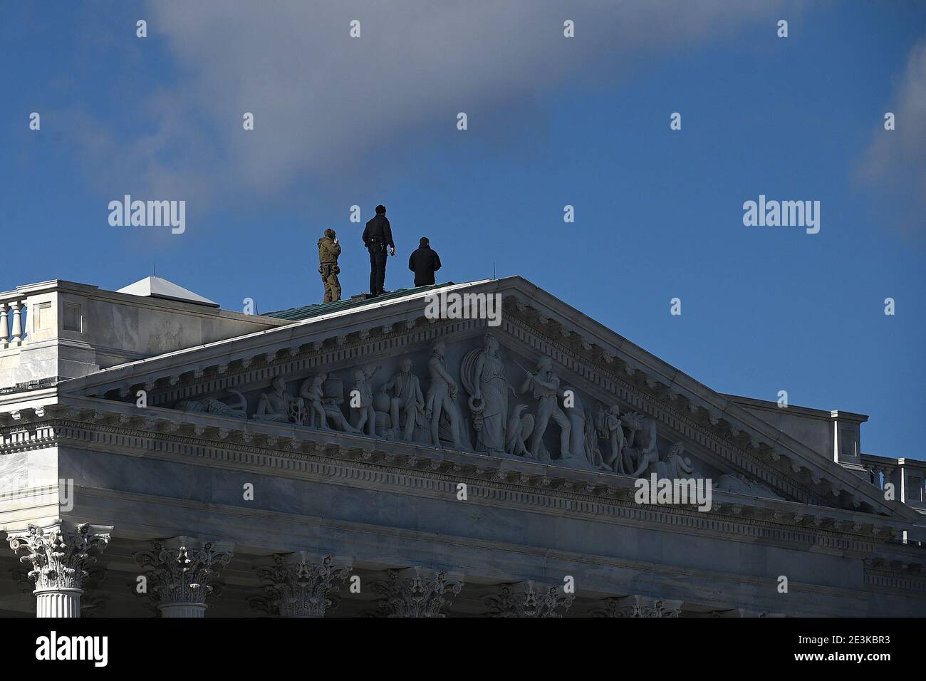 Washington, USA. 19th Jan, 2021. Security team atop Capitol Hill the day before President-elect Joe Biden is sworn in as the 46th President of the United States, Washington, DC, January 19, 2021. (Photo by Anthony Behar/Sipa USA) Credit: Sipa USA/Alamy Live News Stock Photo