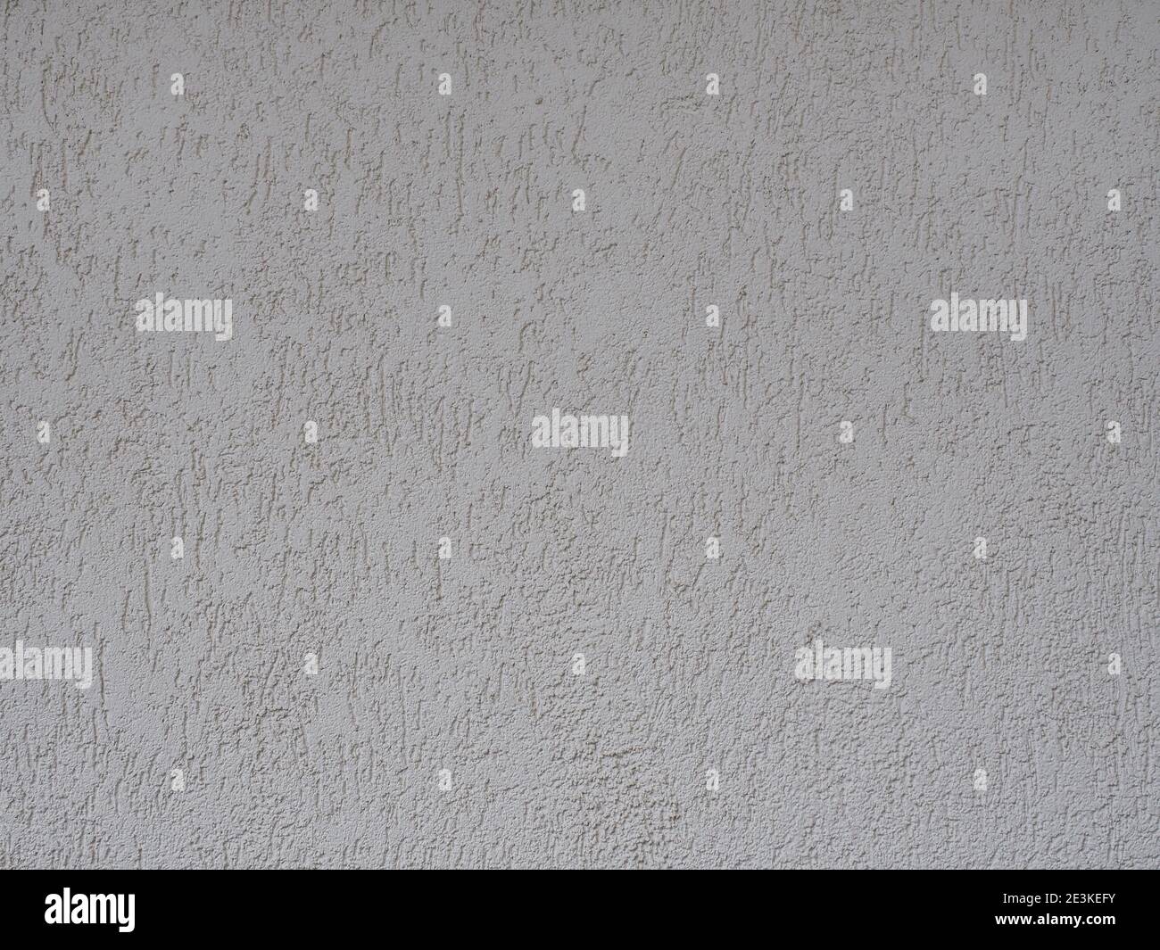Wall with gray embossed decorative cladding. The texture is not seamless. Stock Photo