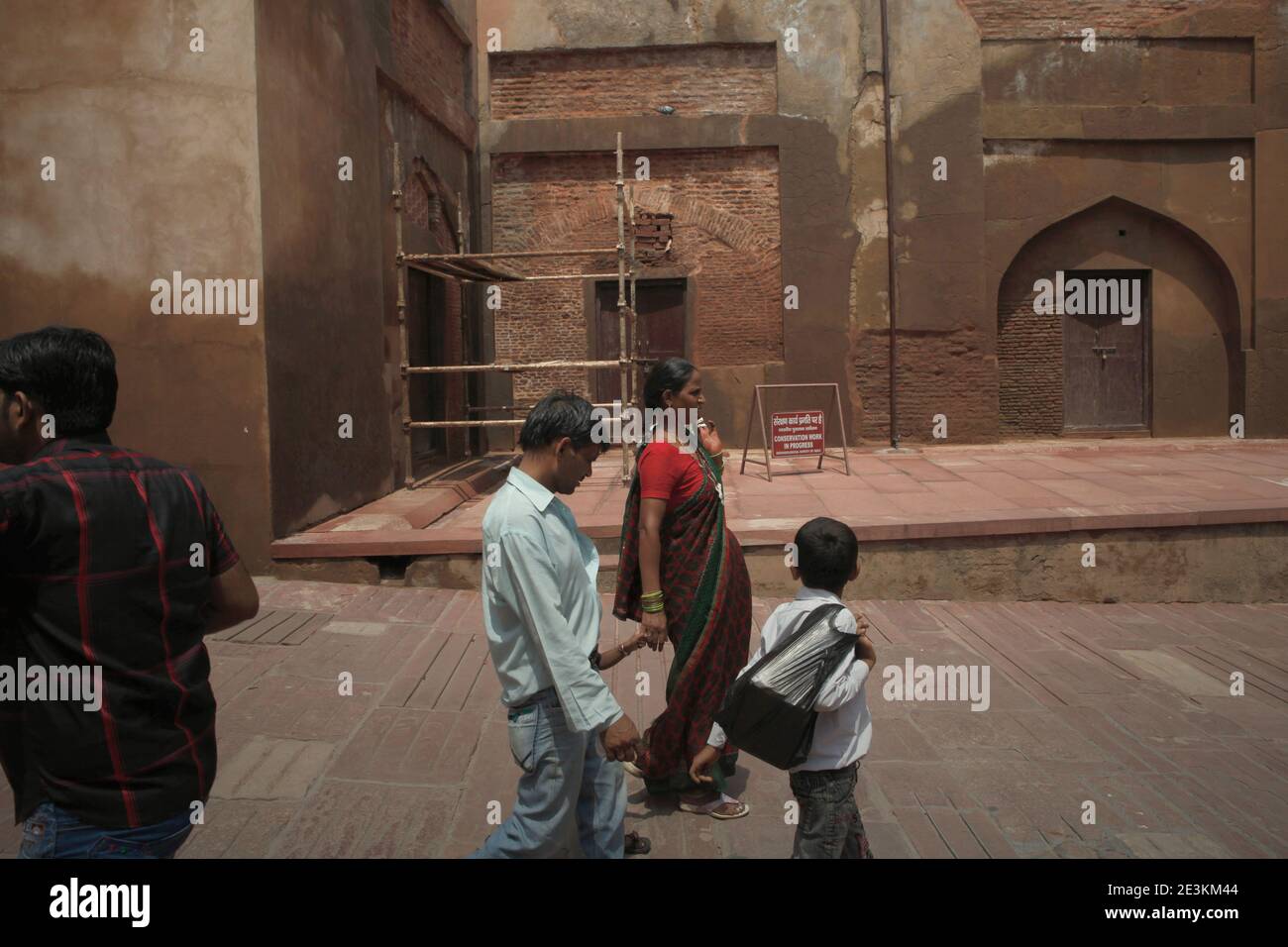 People walking on the walkway inside Agra Fort in Agra, Uttar Pradesh, India. Stock Photo