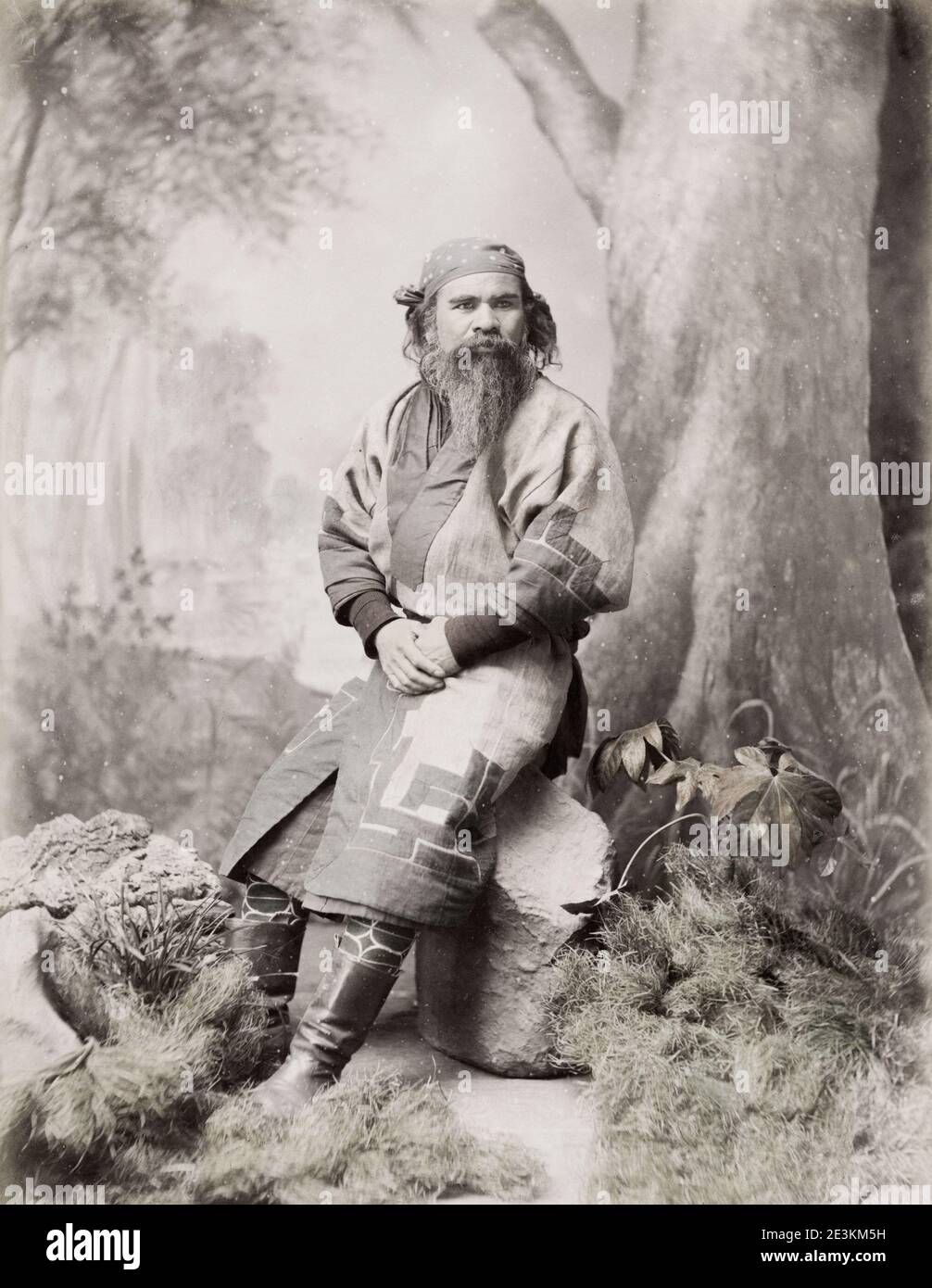 Vintage 19th century photograph: Ainu, Aino man from Haokkaido island, Japan. Stock Photo