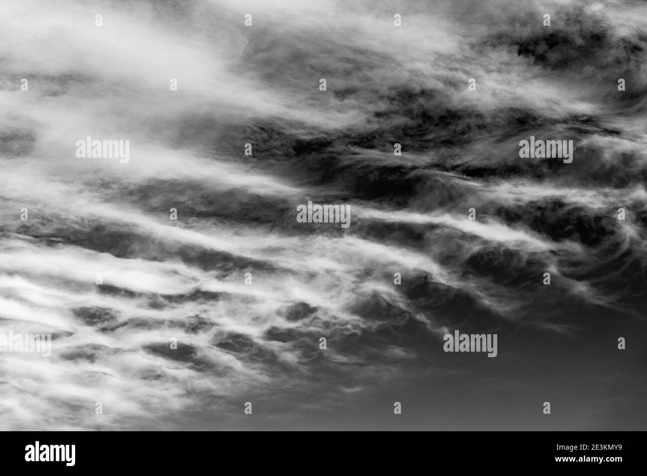 Black & white view of unusual clouds against a clear Colorado sky; Salida; Colorado; USA Stock Photo